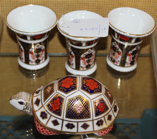 Royal Crown Derby tortoise paperweight, gold stopper & a trio of miniature Imari vases, pattern 1128